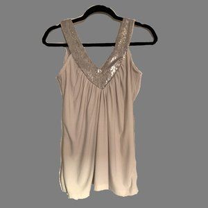 Heavy, flowy, A-line, sequined top.